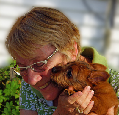 Sylvia Knight hugs tiny terrier